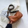 Crossbody bags with embroidered handle