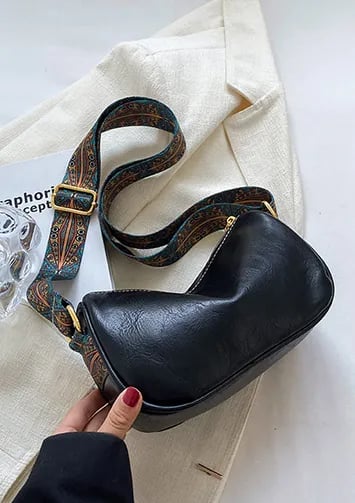 Crossbody bags with embroidered handle