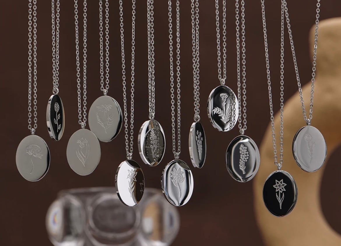 Silver birth flower pendant