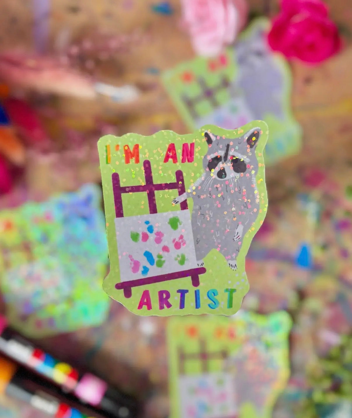 Artist raccoon sticker