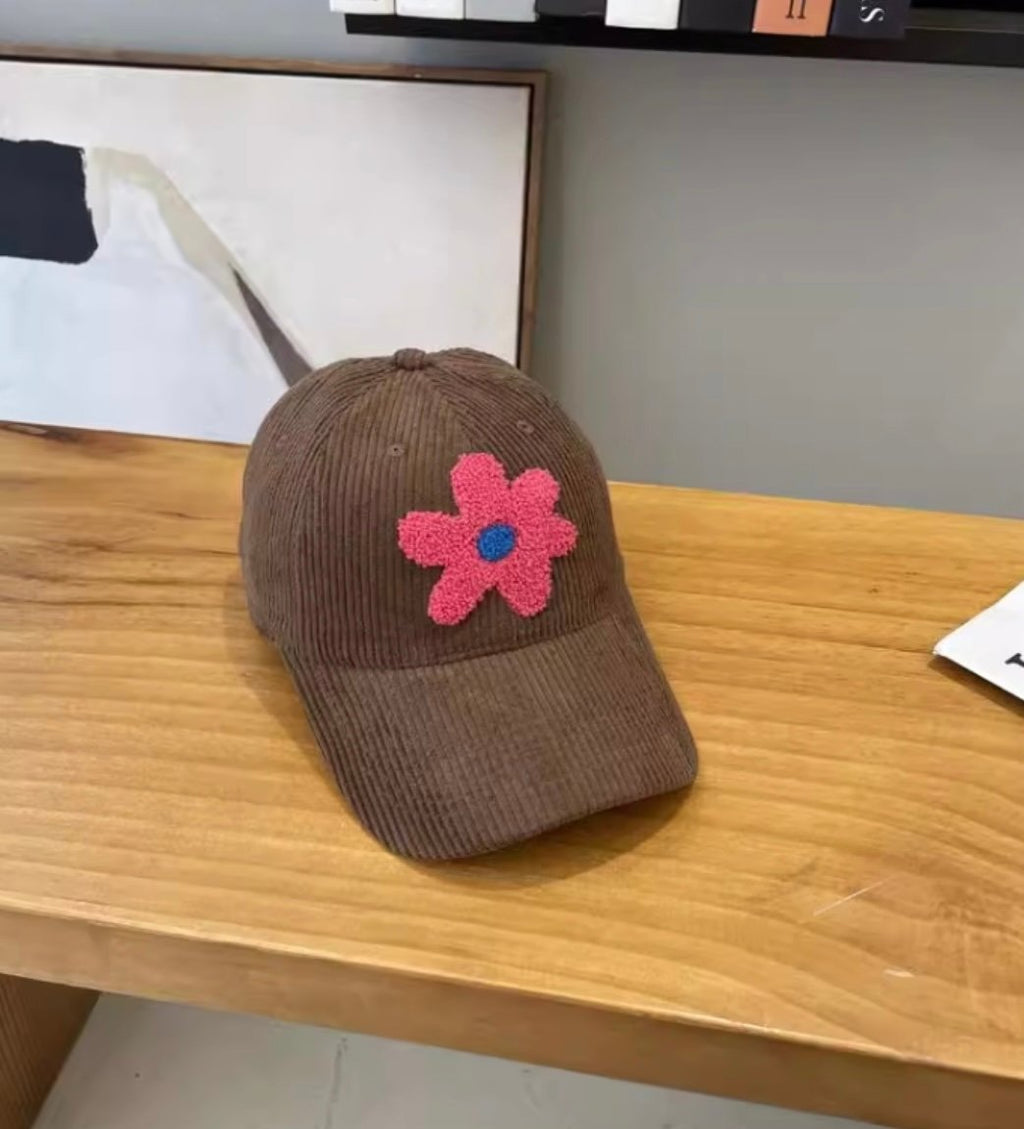 Corduroy caps with plush flower