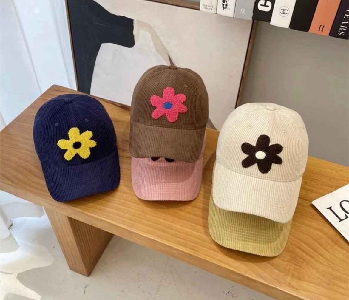 Corduroy caps with plush flower